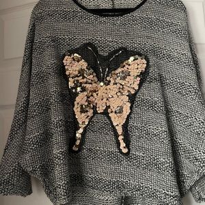 Gray sweater with sequence
